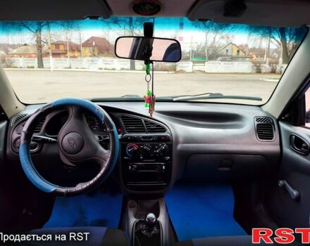 Синий Дэу Ланос, объемом двигателя 1.5 л и пробегом 193 тыс. км за 1850 $, фото 11 на Automoto.ua