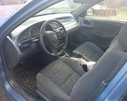 Синий Дэу Ланос, объемом двигателя 1.4 л и пробегом 223 тыс. км за 1066 $, фото 4 на Automoto.ua