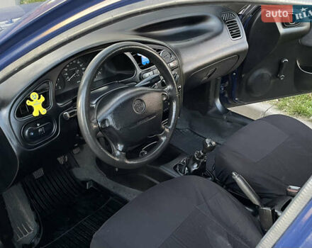 Синій Деу Ланос, об'ємом двигуна 1.5 л та пробігом 140 тис. км за 1450 $, фото 11 на Automoto.ua