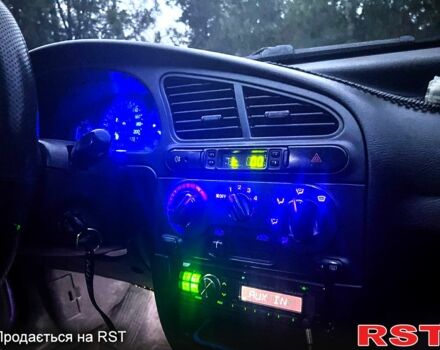 Синій Деу Ланос, об'ємом двигуна 1.4 л та пробігом 200 тис. км за 1999 $, фото 6 на Automoto.ua