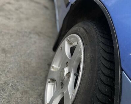 Синий Дэу Ланос, объемом двигателя 1.5 л и пробегом 215 тыс. км за 2350 $, фото 8 на Automoto.ua