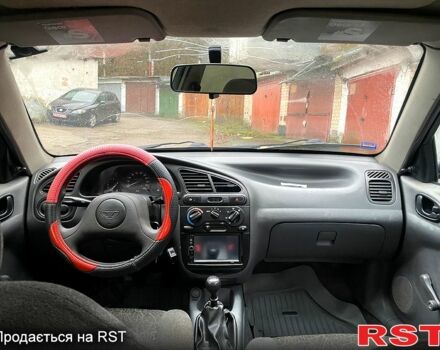 Синій Деу Ланос, об'ємом двигуна 1.5 л та пробігом 245 тис. км за 1650 $, фото 7 на Automoto.ua