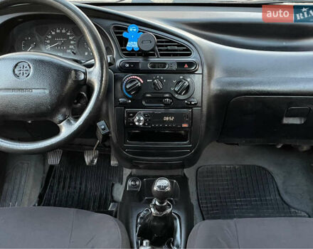 Синій Деу Ланос, об'ємом двигуна 1.5 л та пробігом 140 тис. км за 1450 $, фото 12 на Automoto.ua