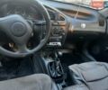 Синий Дэу Ланос, объемом двигателя 1.5 л и пробегом 101 тыс. км за 2000 $, фото 10 на Automoto.ua