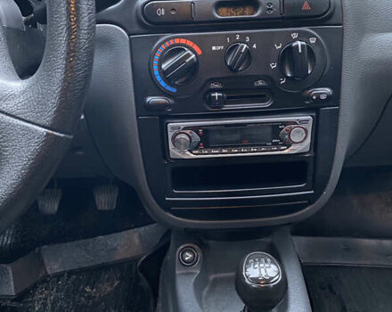 Синій Деу Ланос, об'ємом двигуна 1.5 л та пробігом 76 тис. км за 2850 $, фото 11 на Automoto.ua