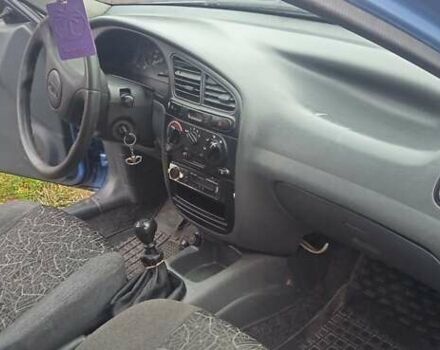 Синий Дэу Ланос, объемом двигателя 1.5 л и пробегом 157 тыс. км за 1550 $, фото 9 на Automoto.ua