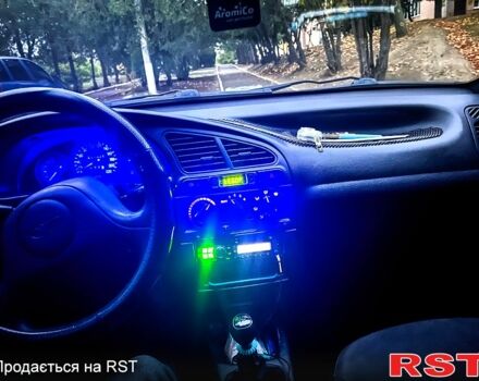 Синій Деу Ланос, об'ємом двигуна 1.4 л та пробігом 200 тис. км за 1999 $, фото 5 на Automoto.ua