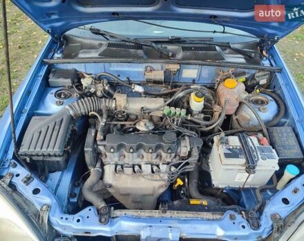 Синій Деу Ланос, об'ємом двигуна 1.5 л та пробігом 188 тис. км за 2000 $, фото 9 на Automoto.ua