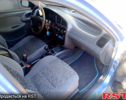 Синий Дэу Ланос, объемом двигателя 1.5 л и пробегом 280 тыс. км за 2100 $, фото 9 на Automoto.ua