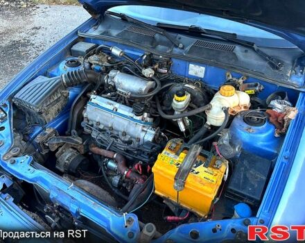 Синій Деу Ланос, об'ємом двигуна 1.4 л та пробігом 250 тис. км за 2000 $, фото 3 на Automoto.ua