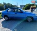Синий Дэу Ланос, объемом двигателя 1.5 л и пробегом 248 тыс. км за 2200 $, фото 3 на Automoto.ua