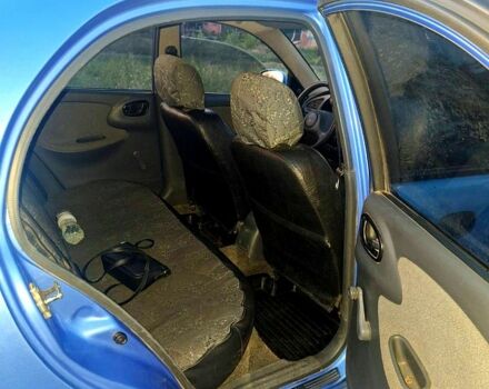 Синий Дэу Ланос, объемом двигателя 1.4 л и пробегом 230 тыс. км за 2160 $, фото 4 на Automoto.ua