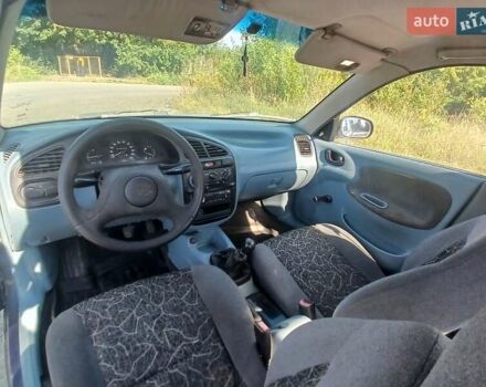 Синій Деу Ланос, об'ємом двигуна 1.5 л та пробігом 220 тис. км за 1380 $, фото 9 на Automoto.ua