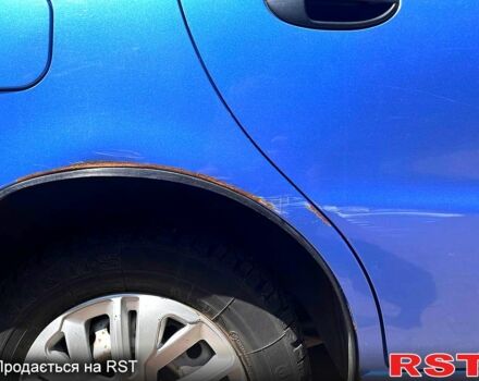 Синий Дэу Ланос, объемом двигателя 1.4 л и пробегом 79 тыс. км за 2200 $, фото 6 на Automoto.ua