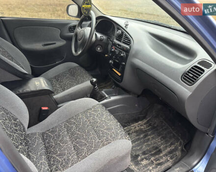 Синій Деу Ланос, об'ємом двигуна 1.39 л та пробігом 200 тис. км за 2350 $, фото 8 на Automoto.ua