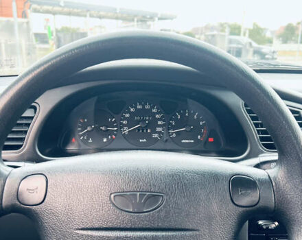 Синий Дэу Ланос, объемом двигателя 1.6 л и пробегом 310 тыс. км за 2200 $, фото 11 на Automoto.ua