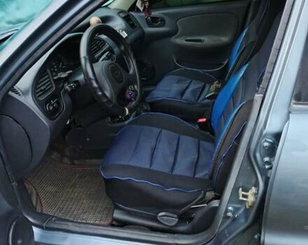 Синий Дэу Ланос, объемом двигателя 1.5 л и пробегом 230 тыс. км за 2600 $, фото 5 на Automoto.ua