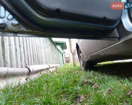 Синий Дэу Ланос, объемом двигателя 1.6 л и пробегом 310 тыс. км за 2200 $, фото 15 на Automoto.ua