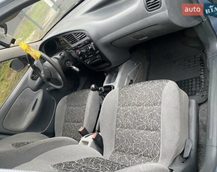 Синий Дэу Ланос, объемом двигателя 1.5 л и пробегом 140 тыс. км за 1750 $, фото 10 на Automoto.ua