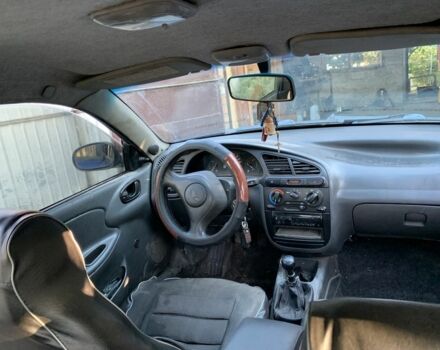 Синій Деу Ланос, об'ємом двигуна 1.5 л та пробігом 3 тис. км за 2000 $, фото 5 на Automoto.ua