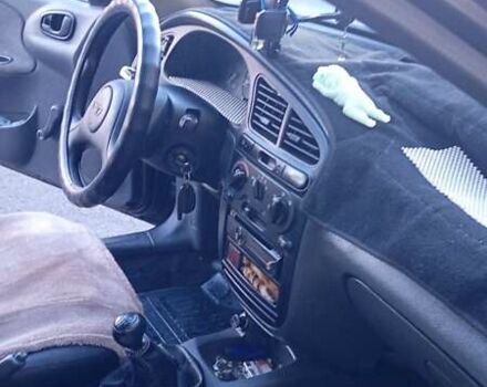 Синий Дэу Ланос, объемом двигателя 1.5 л и пробегом 343 тыс. км за 2300 $, фото 11 на Automoto.ua