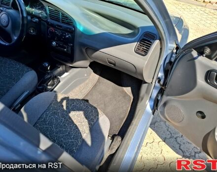 Синий Дэу Ланос, объемом двигателя 1.5 л и пробегом 155 тыс. км за 2600 $, фото 6 на Automoto.ua