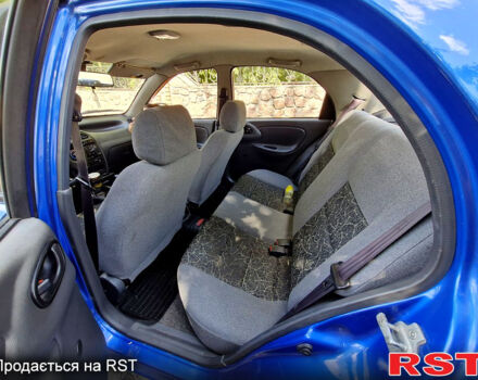 Синий Дэу Ланос, объемом двигателя 1.4 л и пробегом 160 тыс. км за 1499 $, фото 5 на Automoto.ua