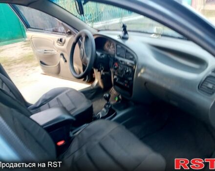 Синій Деу Ланос, об'ємом двигуна 1.4 л та пробігом 181 тис. км за 2400 $, фото 9 на Automoto.ua
