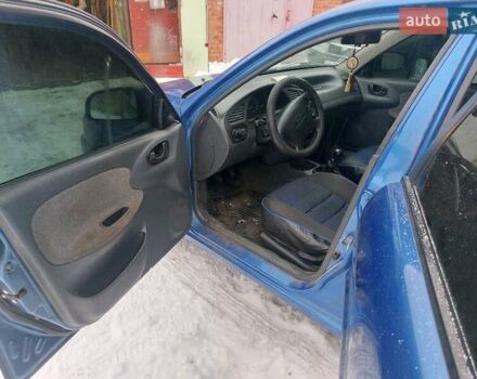 Синий Дэу Ланос, объемом двигателя 1.6 л и пробегом 262 тыс. км за 2700 $, фото 10 на Automoto.ua