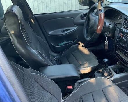 Синий Дэу Ланос, объемом двигателя 1.5 л и пробегом 100 тыс. км за 2000 $, фото 3 на Automoto.ua