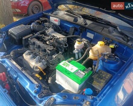 Синий Дэу Ланос, объемом двигателя 1.5 л и пробегом 100 тыс. км за 2750 $, фото 38 на Automoto.ua