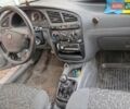 Синій Деу Ланос, об'ємом двигуна 1.39 л та пробігом 167 тис. км за 2400 $, фото 4 на Automoto.ua