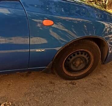 Синий Дэу Ланос, объемом двигателя 1.5 л и пробегом 170 тыс. км за 1850 $, фото 14 на Automoto.ua