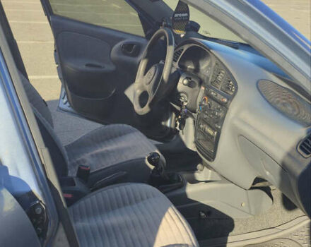 Синий Дэу Ланос, объемом двигателя 1.5 л и пробегом 318 тыс. км за 2700 $, фото 5 на Automoto.ua