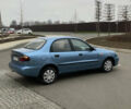Синий Дэу Ланос, объемом двигателя 1.5 л и пробегом 200 тыс. км за 2200 $, фото 2 на Automoto.ua