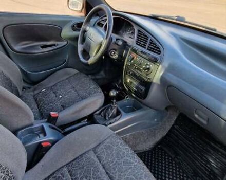 Синий Дэу Ланос, объемом двигателя 1.6 л и пробегом 266 тыс. км за 3100 $, фото 6 на Automoto.ua