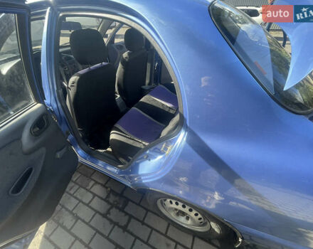Синий Дэу Ланос, объемом двигателя 1.5 л и пробегом 102 тыс. км за 2600 $, фото 7 на Automoto.ua