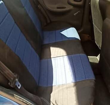 Синий Дэу Ланос, объемом двигателя 1.5 л и пробегом 170 тыс. км за 1850 $, фото 7 на Automoto.ua