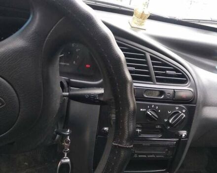 Синій Деу Ланос, об'ємом двигуна 1.5 л та пробігом 164 тис. км за 2517 $, фото 3 на Automoto.ua