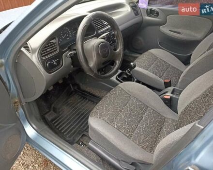 Синий Дэу Ланос, объемом двигателя 1.5 л и пробегом 125 тыс. км за 2900 $, фото 5 на Automoto.ua