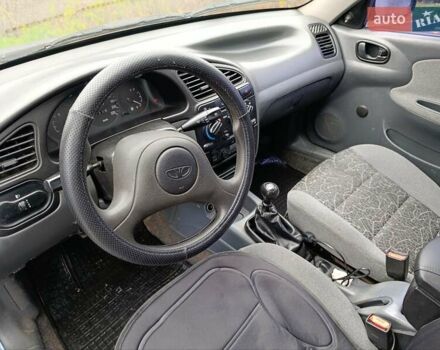 Синій Деу Ланос, об'ємом двигуна 1.5 л та пробігом 183 тис. км за 2450 $, фото 12 на Automoto.ua