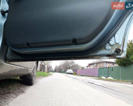 Синий Дэу Ланос, объемом двигателя 1.6 л и пробегом 310 тыс. км за 2200 $, фото 17 на Automoto.ua