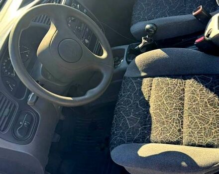 Синий Дэу Ланос, объемом двигателя 1.5 л и пробегом 122 тыс. км за 2600 $, фото 2 на Automoto.ua