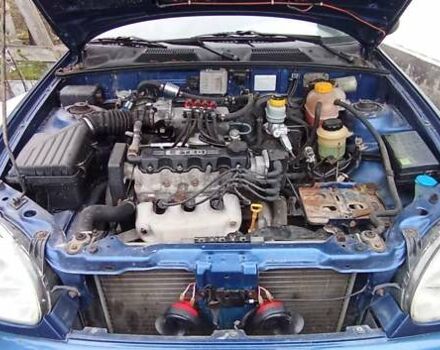 Синій Деу Ланос, об'ємом двигуна 1.5 л та пробігом 182 тис. км за 1350 $, фото 3 на Automoto.ua