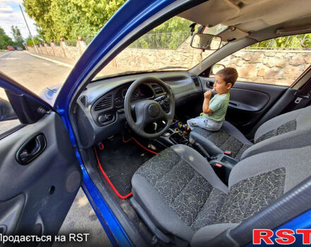 Синий Дэу Ланос, объемом двигателя 1.4 л и пробегом 160 тыс. км за 1499 $, фото 7 на Automoto.ua