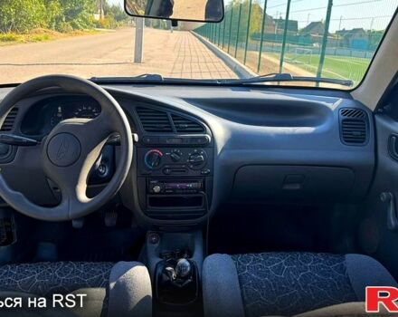 Синий Дэу Ланос, объемом двигателя 1.5 л и пробегом 122 тыс. км за 2600 $, фото 3 на Automoto.ua