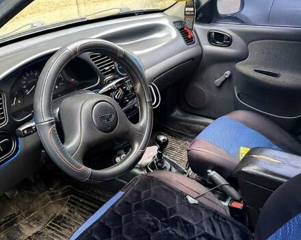 Синий Дэу Ланос, объемом двигателя 1.5 л и пробегом 201 тыс. км за 2300 $, фото 2 на Automoto.ua