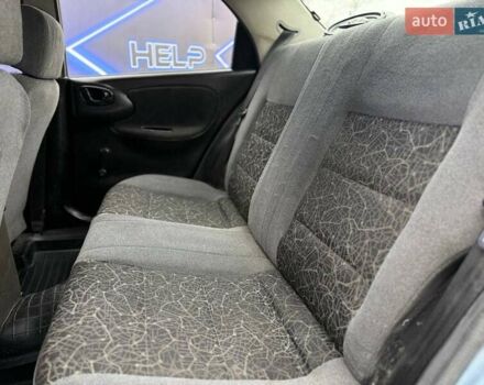 Синий Дэу Ланос, объемом двигателя 1.5 л и пробегом 180 тыс. км за 3299 $, фото 8 на Automoto.ua