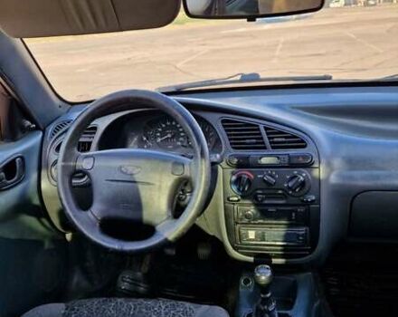 Синий Дэу Ланос, объемом двигателя 1.6 л и пробегом 266 тыс. км за 3100 $, фото 9 на Automoto.ua