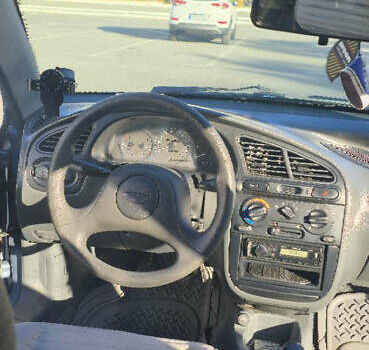 Синий Дэу Ланос, объемом двигателя 1.5 л и пробегом 318 тыс. км за 2700 $, фото 7 на Automoto.ua